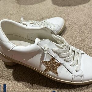 Elegant White Sneakers with Gold Star Accent
